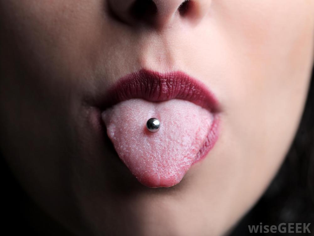 Cute Girl Showing Her Single Tongue Piercing