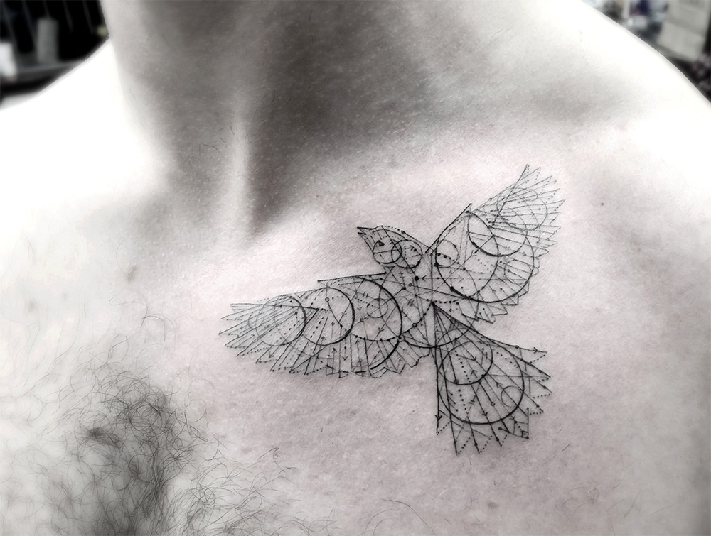 Geometric Bird Tattoo On Man Chest