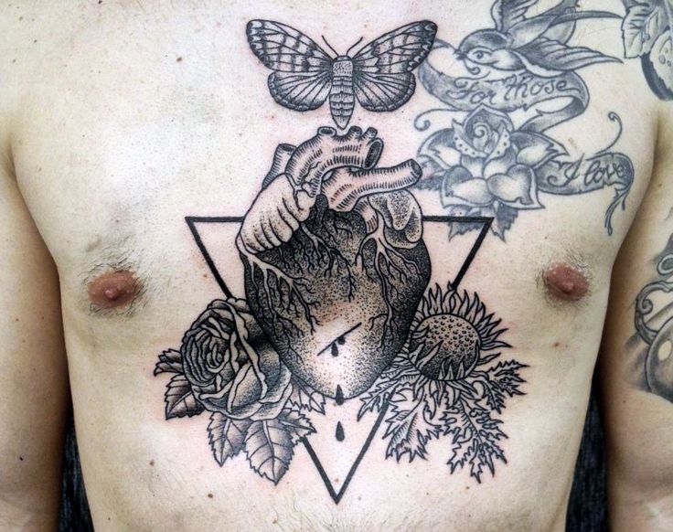 Grey Ink Dotwork Real Heart With Flowers And Butterfly Tattoo On Man Chest