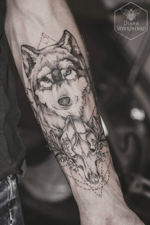 Grey Ink Dotwork Wolf Head Tattoo On Forearm