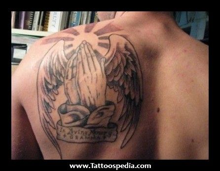 Grey Ink Praying Hands With Wings Tattoo On Man Left Back Shoulder