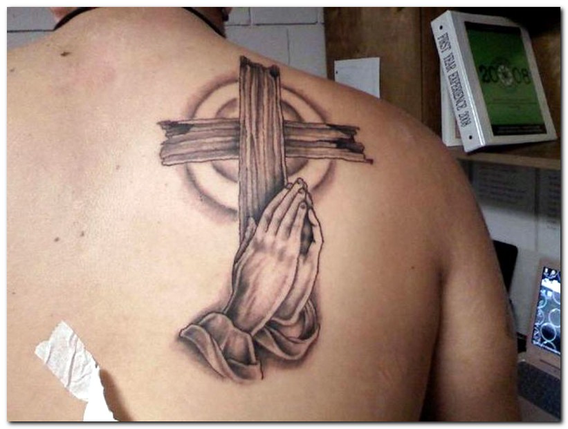 Grey Ink Praying Hands With Wooden Cross Tattoo On Right Back Shoulder