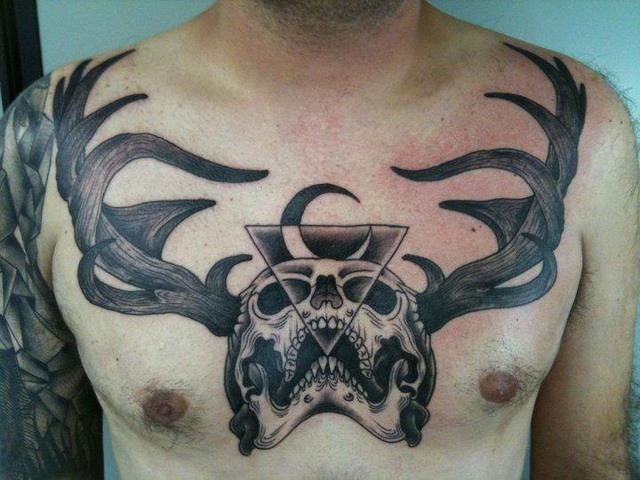 Grey Ink Skull With Prism Tattoo On Man Chest