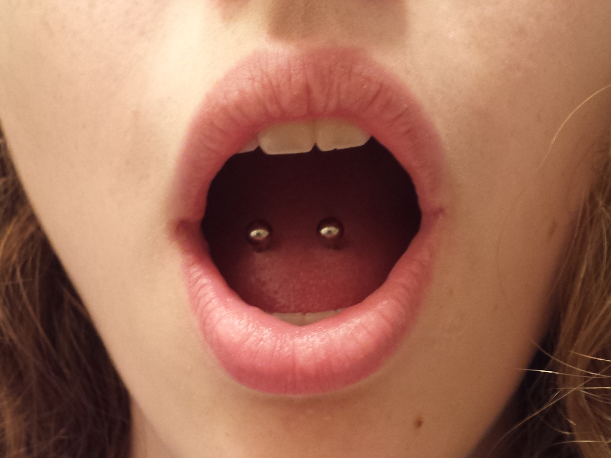 Nice Surface Barbell Tongue Piercing Image