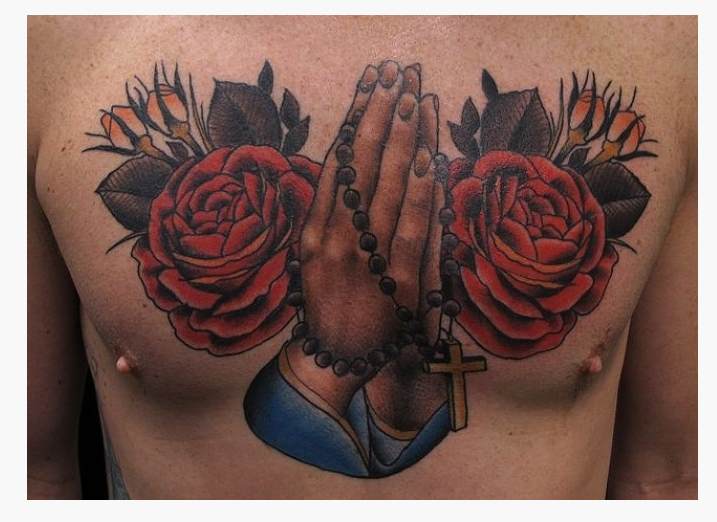 Praying Hands With Red Roses Tattoo On Man Chest