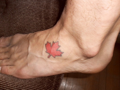 Red Maple Leaf Tattoo On Foot