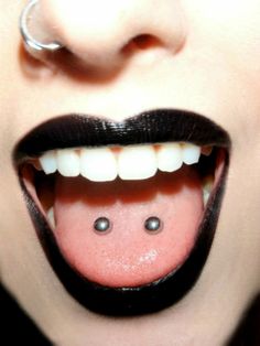 Right Nostril And Tongue Surface Piercing