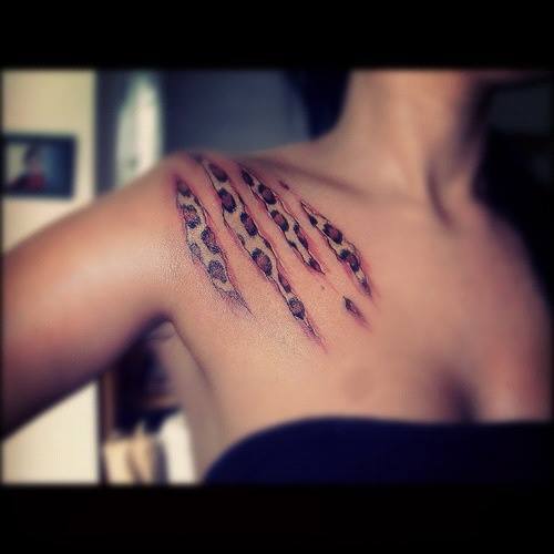 Ripped Skin Paw Scratch Tattoo On Girl Collarbone