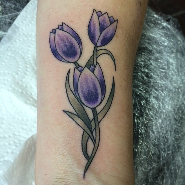 Three Purple Tulip Flowers Tattoo Design