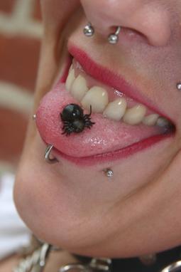 Tongue Piercing With Black Bug Stud