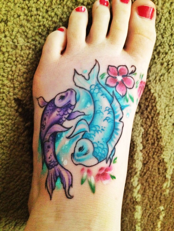 Watercolor Pisces Tattoo On Girl Foot