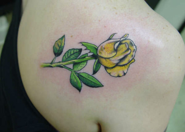 Yellow Tulip Flower Tattoo On Right Back Shoulder