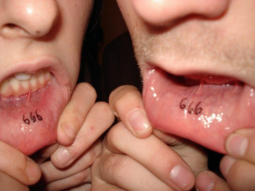 666 Lettering Tattoo On Couple Inner Lip