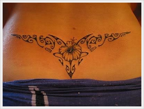 Amazing Black Flower Tattoo On Lower Back