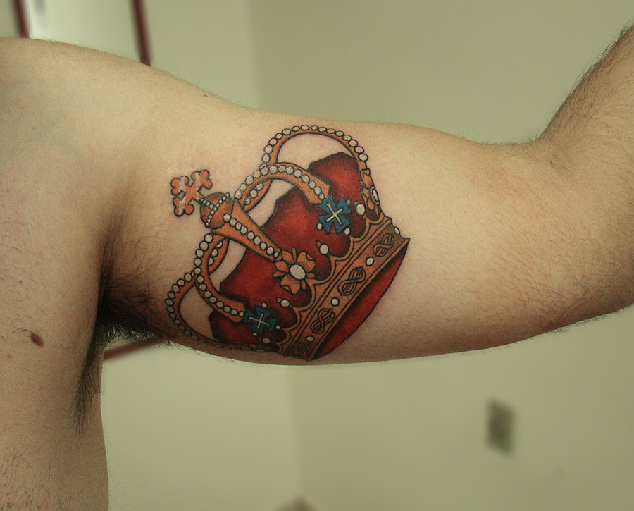 Amazing Colorful Crown Tattoo On Bicep By Blackfish
