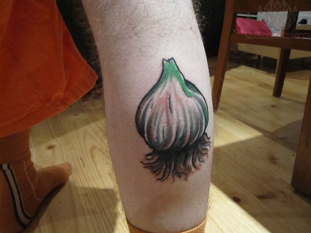 Amazing Garlic Tattoo On Leg Calf