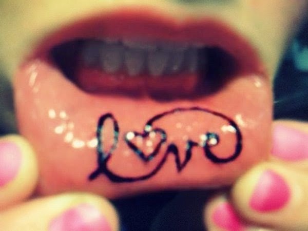 Amazing Love Lettering Tattoo On Inner Lip