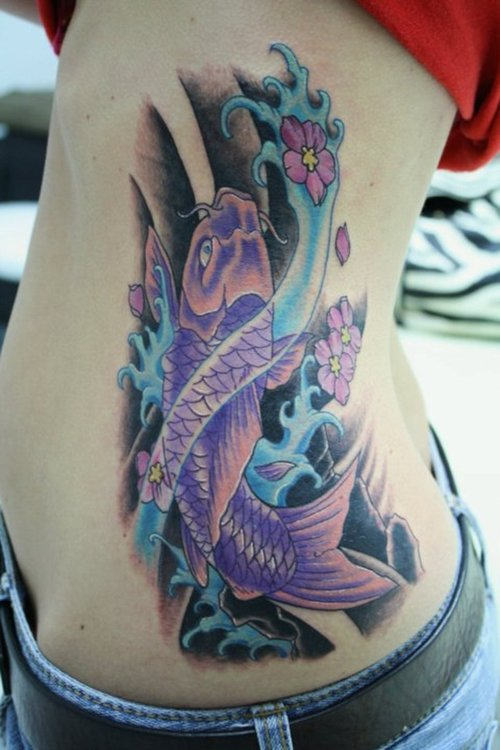 Amazing Purple Koi Fish With Flowers Tattoo On Side Rib