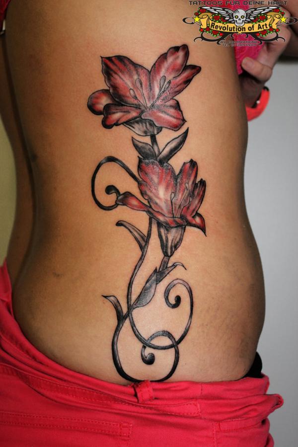 Amazing Red And Black Lily Flowers Tattoo On Side Rib By Aineg