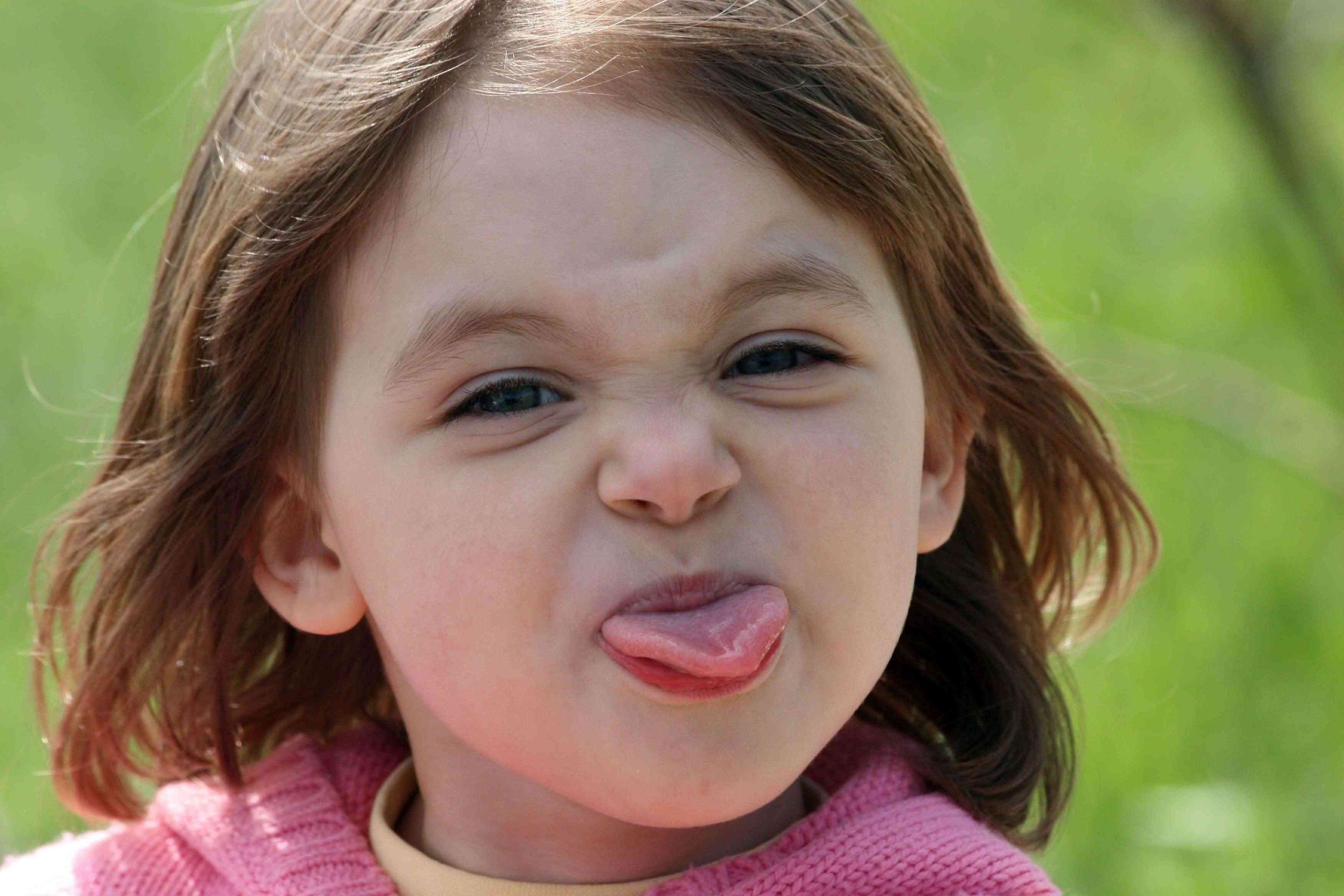 Baby Girl Showing Tongue Funny Picture