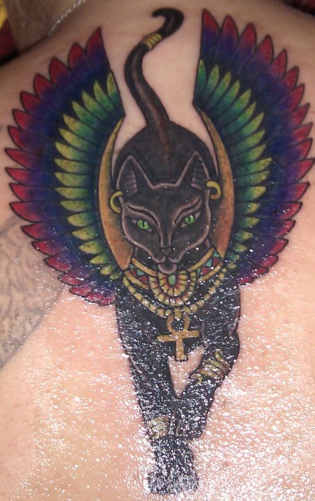 Bastet With Colorful Wings Tattoo On Man Upper Back By Stephanie