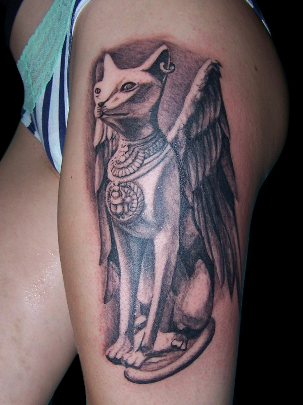 Bastet With Wings Statue Tattoo On Girl Side Thigh
