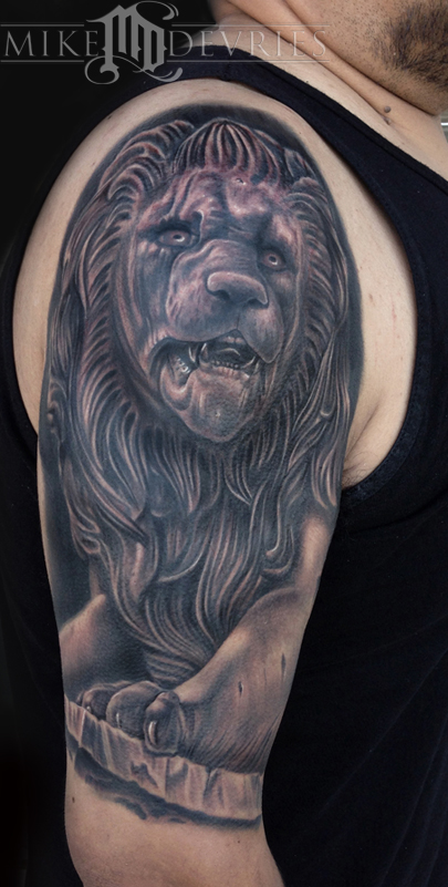 Black And Grey 3D Lion Statue Tattoo On Man Half Sleeve