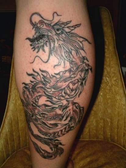 Black And Grey Dragon Tattoo On Leg Calf