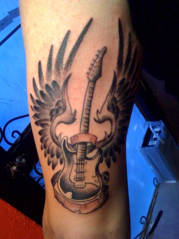 Black And Grey Guitar With Wings Tattoo Design