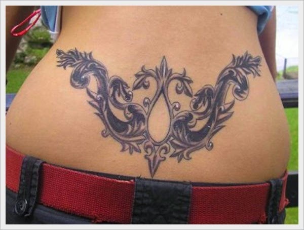 Black And Grey Unique Design Tattoo On Lower Back