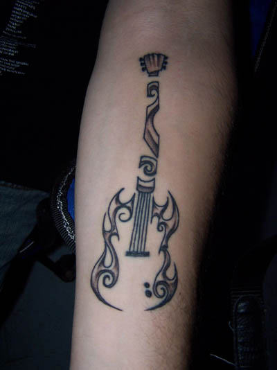 Black And Grey Unique Guitar Tattoo On Forearm