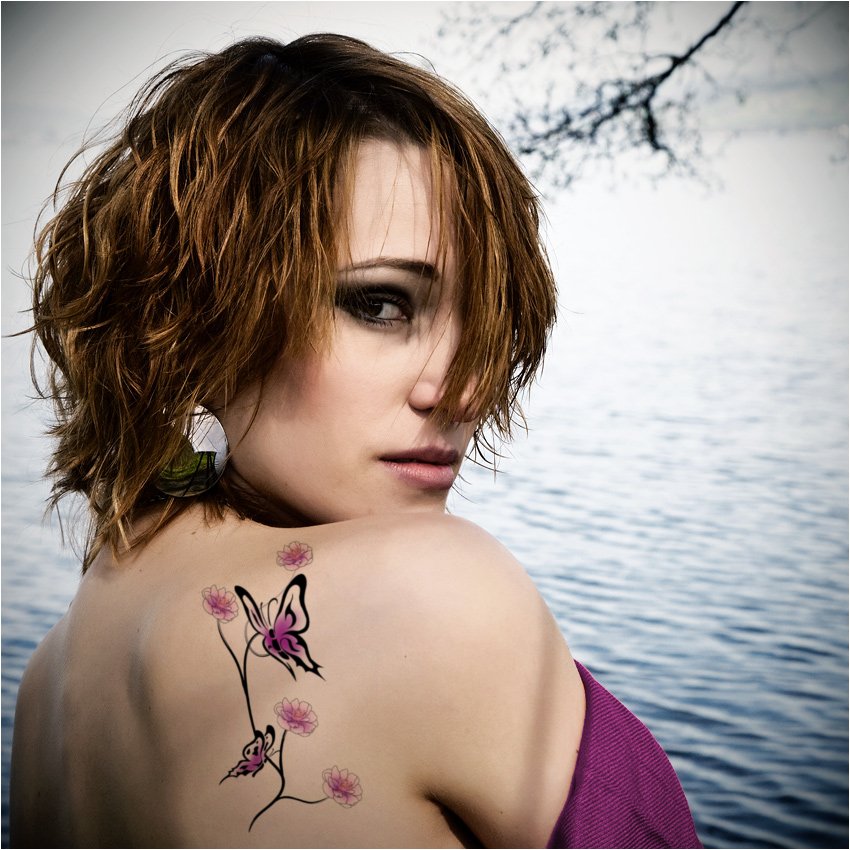 Black And Pink Two Butterflies With Flowers Tattoo On Women Right Back Shoulder