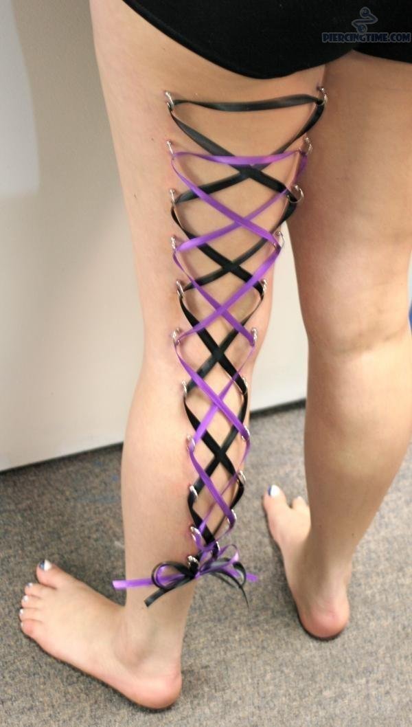 Black And Purple Ribbons Leg Piercing