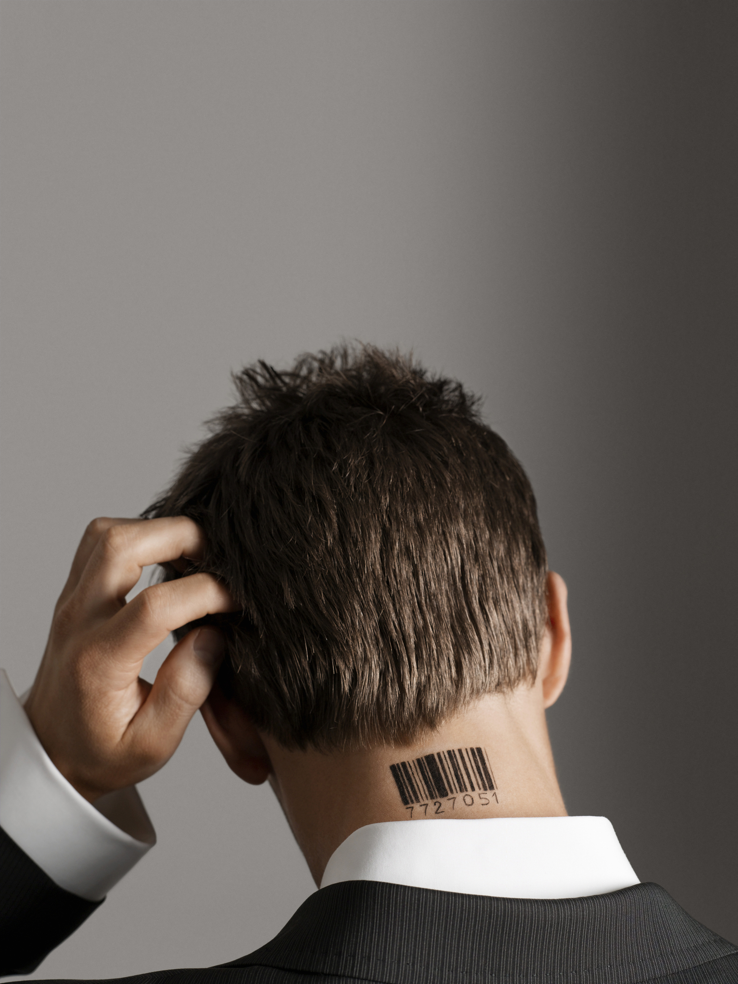 Black Barcode Tattoo On Man Back Neck
