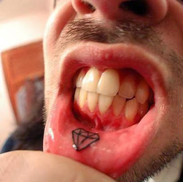 Black Diamond Tattoo On Man Inner Lip