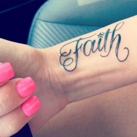 Black Faith Lettering Tattoo On Girl Wrist