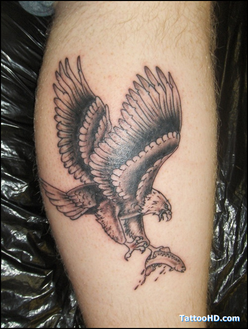 Black Ink Flying Eagle Tattoo On Leg Calf