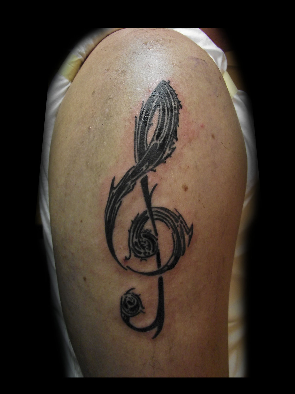 Black Ink Violin Key Tattoo by Selejit