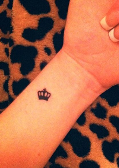 Black Little Crown Tattoo On Wrist