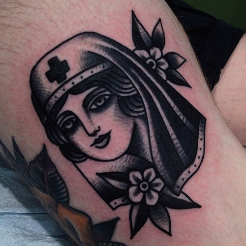 Black Nurse Face Tattoo Design