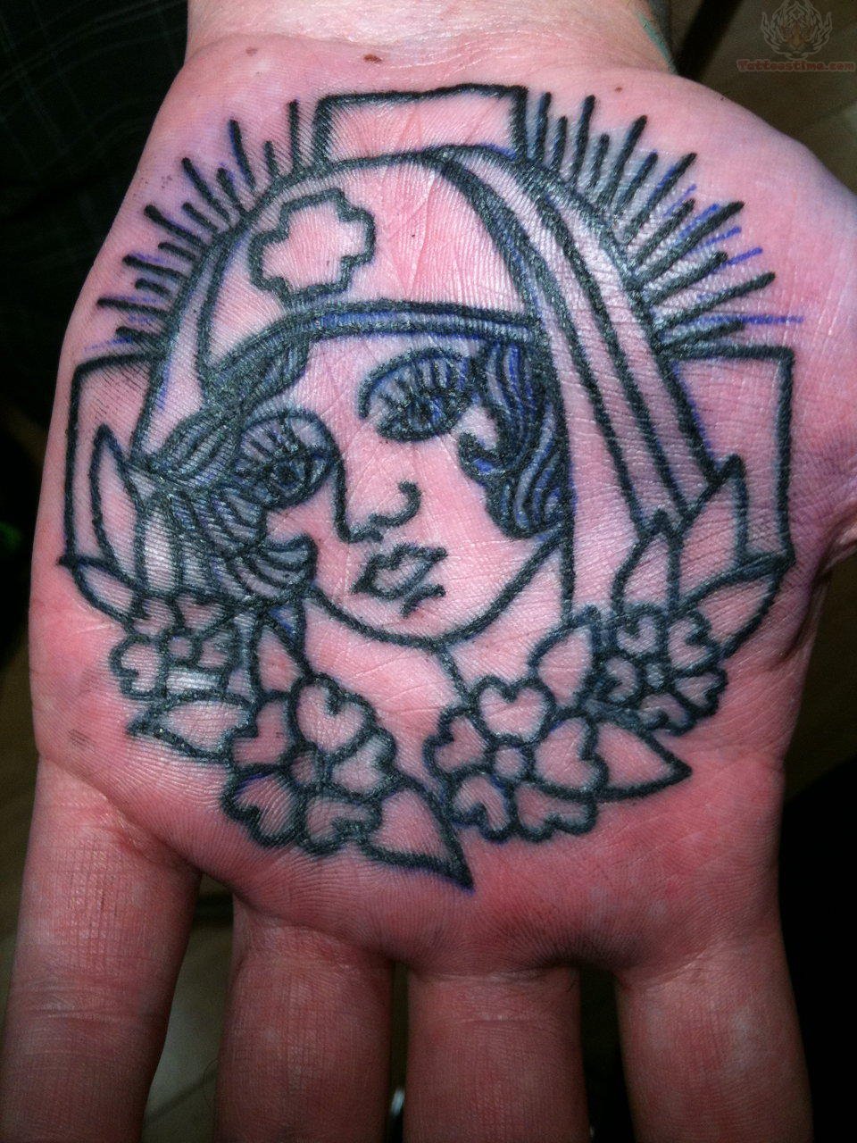 Black Nurse Face With Flowers Tattoo On Hand Palm