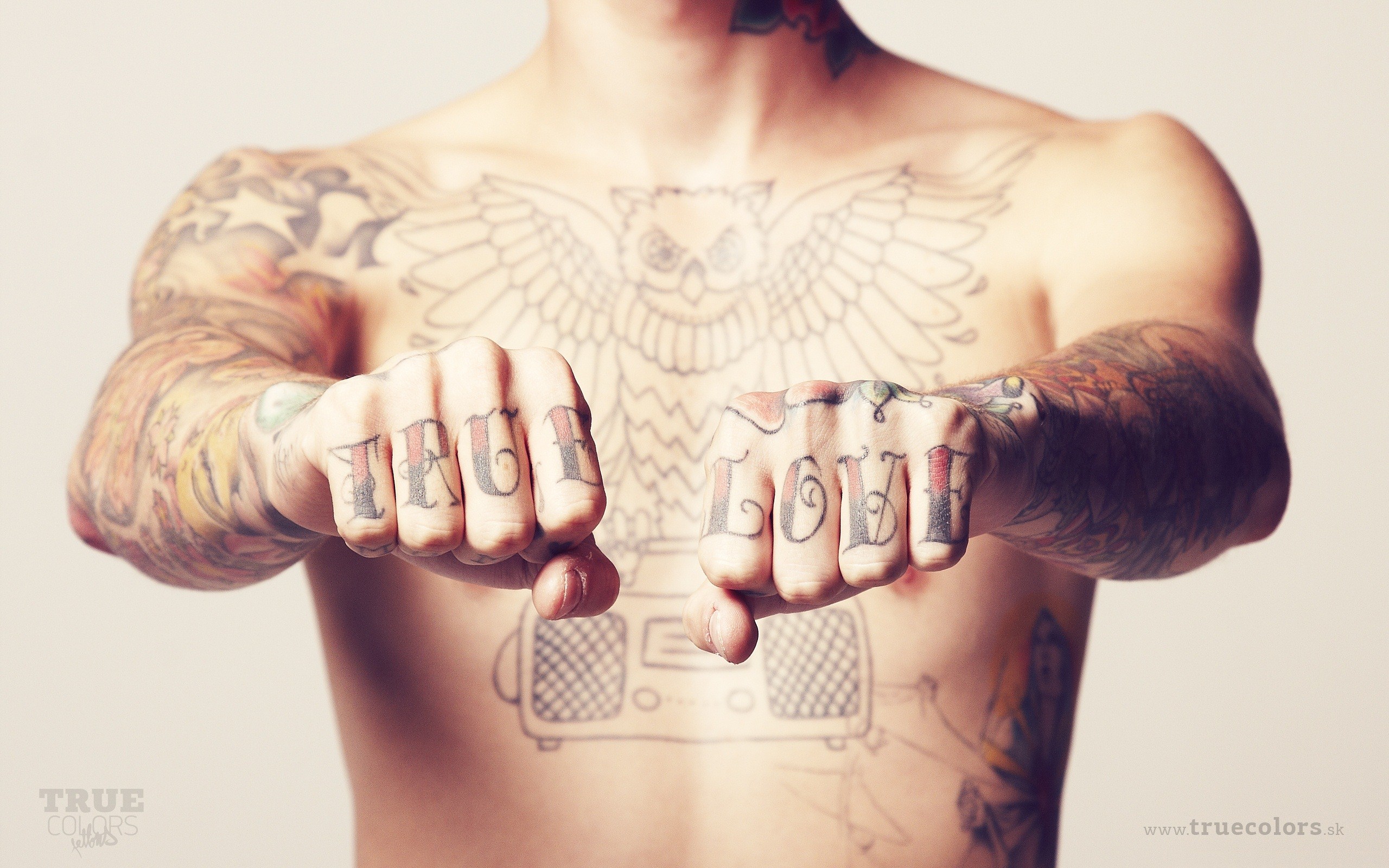 Black Outline Owl On Tattoo On Man Chest And True Love Knuckles Tattoo