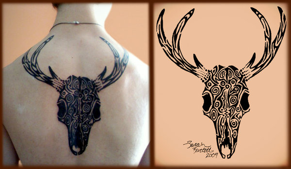 Black Tribal Deer Skull Tattoo On Man Upper Back
