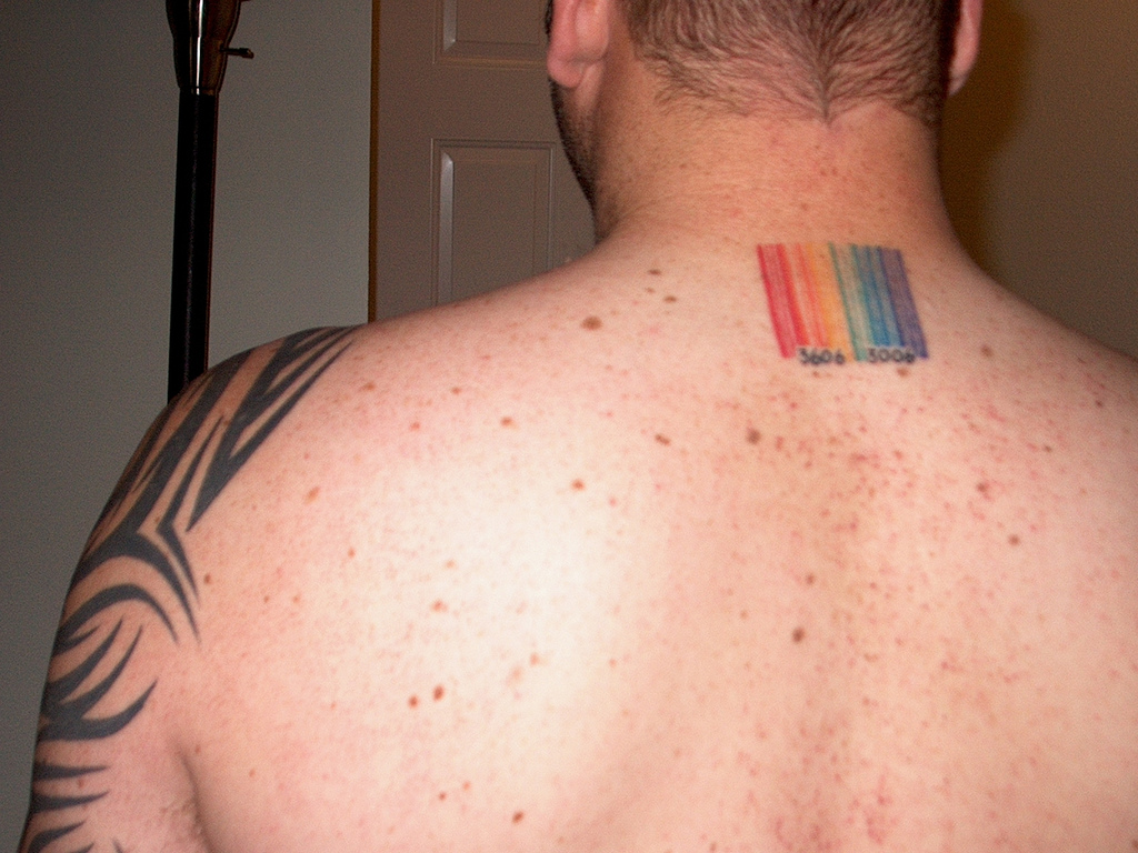 Colorful Barcode Tattoo On Man Back Neck By Dtarpennation