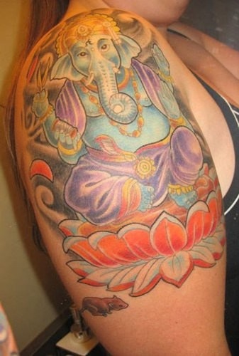 Colorful Ganesha On Lotus Tattoo On Right Shoulder