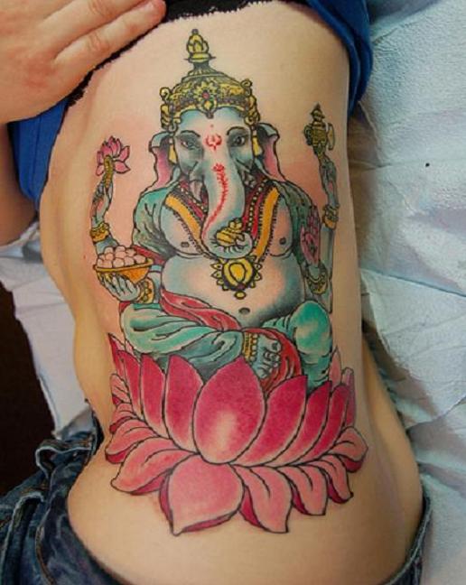 Colorful Ganesha On Lotus Tattoo On Side Rib