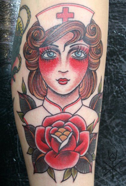 Colorful Nurse With Rose Tattoo On Leg Calf