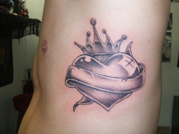 Crown On Heart With Banner Tattoo On Side Rib By Valeria