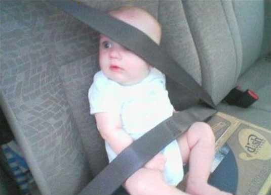 Cute Baby With Safety Belt Funny Picture