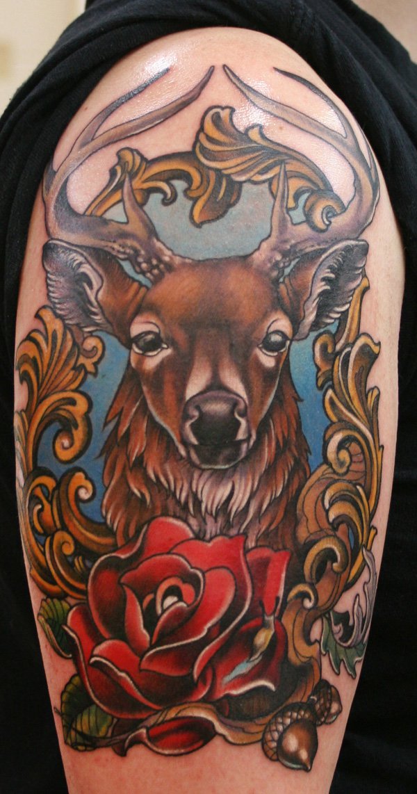 Deer Head In Frame With Red Rose Tattoo On Shoulder
